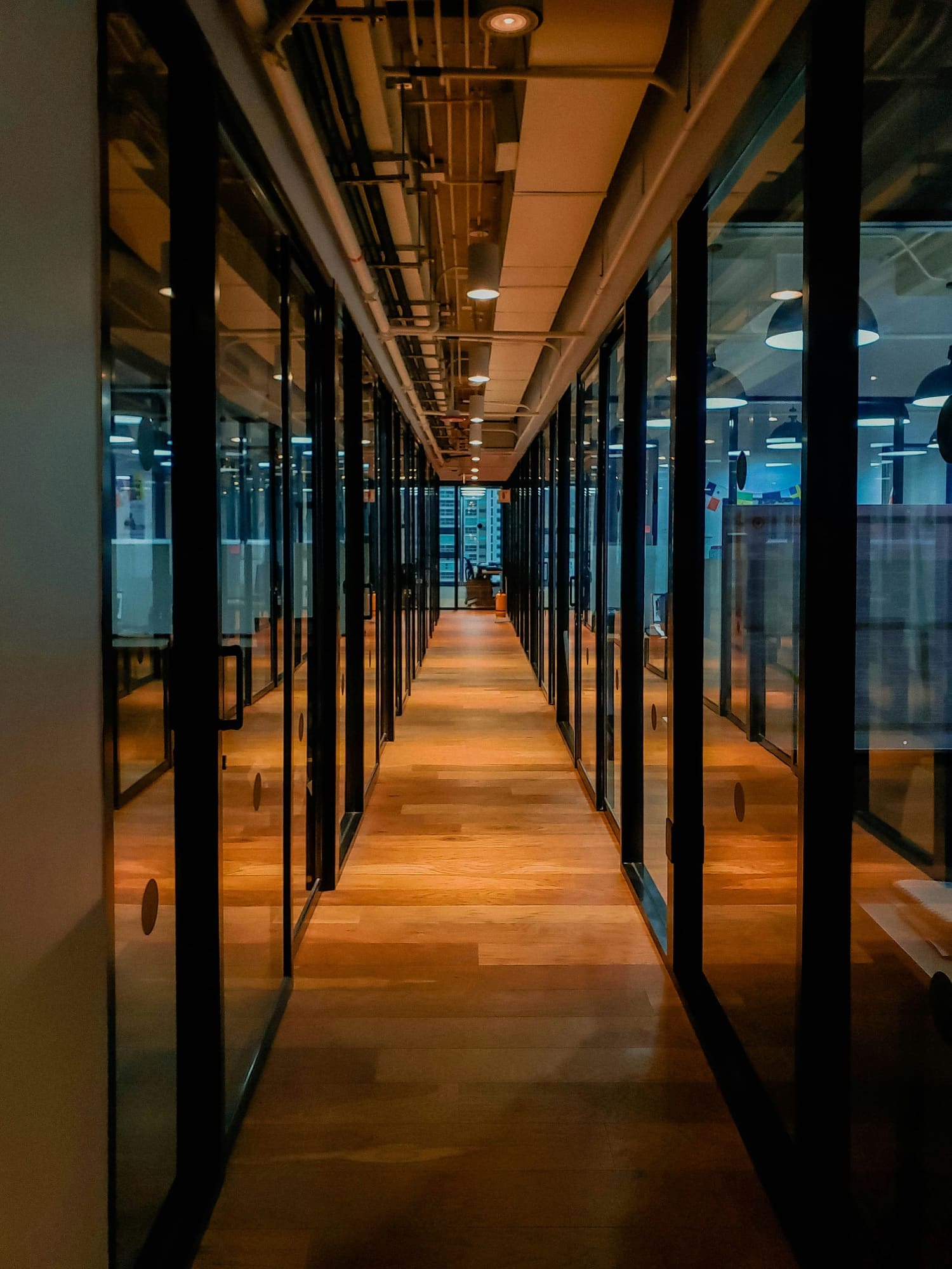 A clear corridor leading through an ordered workspace